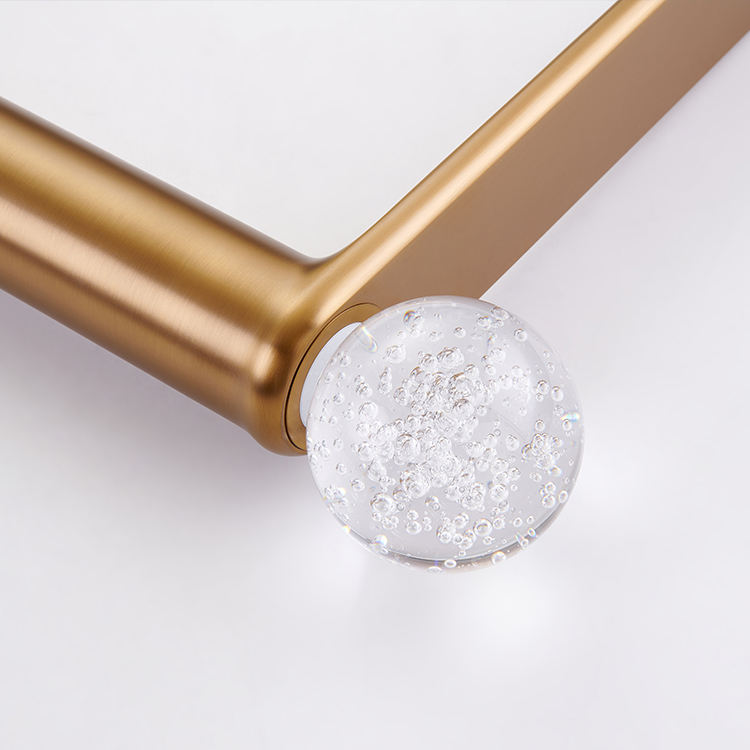 Sleek deck-mounted basin tap featuring a brushed brass finish